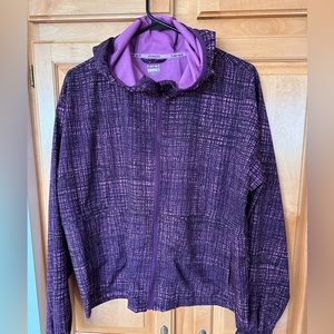 Hind running jacket, purple and black design.